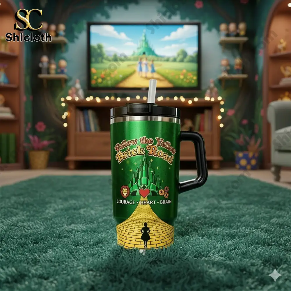 Green insulated tumbler with yellow brick road design in cozy fantasy room!