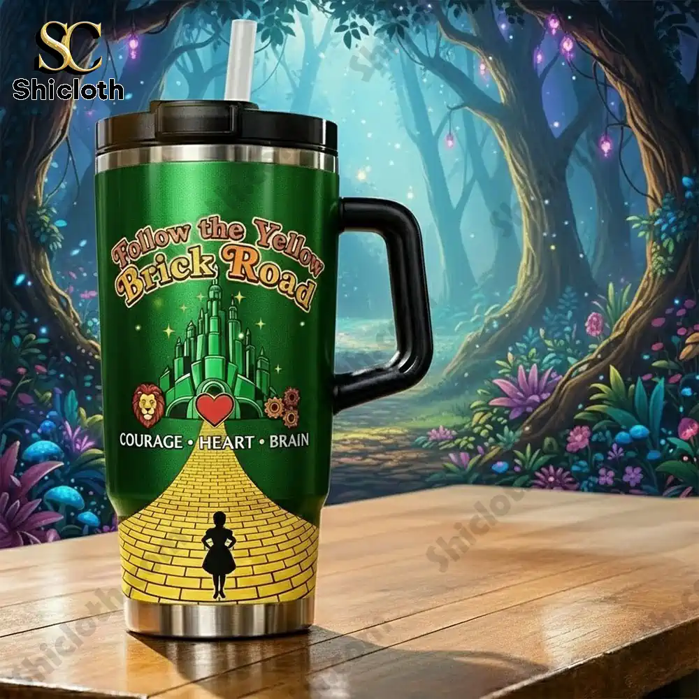 Green insulated tumbler with yellow brick road in enchanted forest setting!