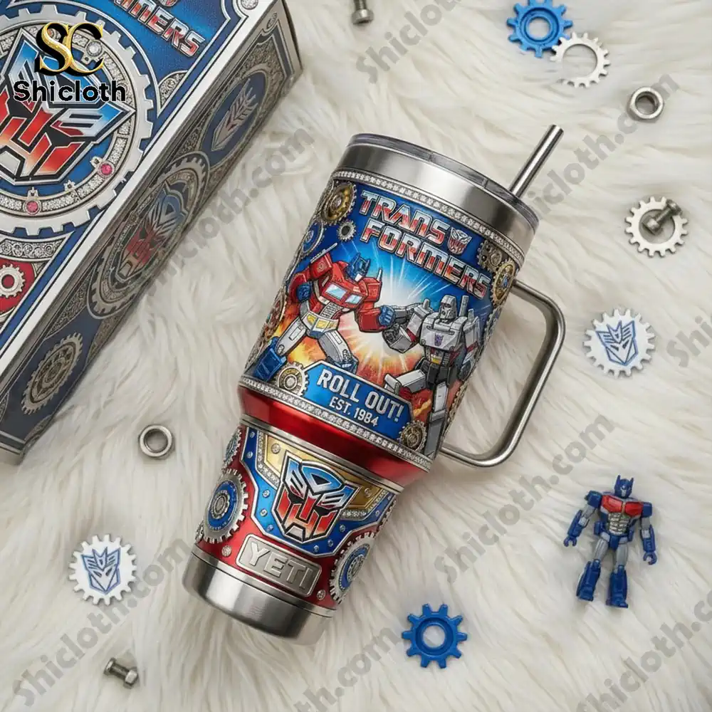 Transformers Optimus Prime And Megatron Tumbler With Handle 4 Transformers Yeti cup laid flat with robot accessories!
