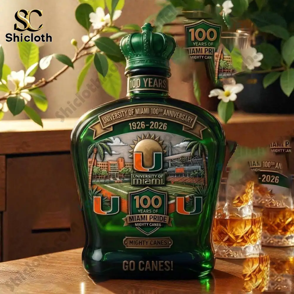 University Of Miami 100th Anniversary Go Canes Whiskey Glass Bottle 2 University of Miami anniversary whiskey bottle on wooden table!