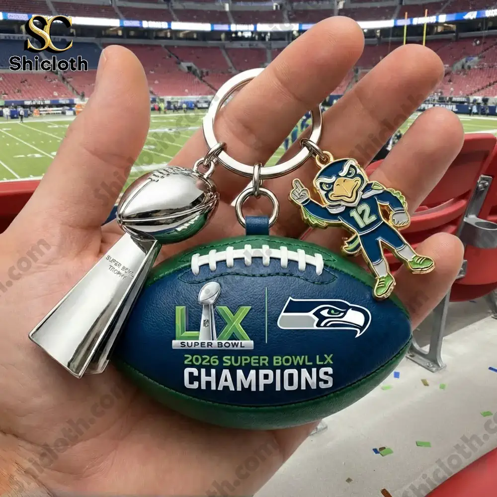 Seattle Seahawks Super Bowl LX Champions football keychain with trophy charm in stadium background!