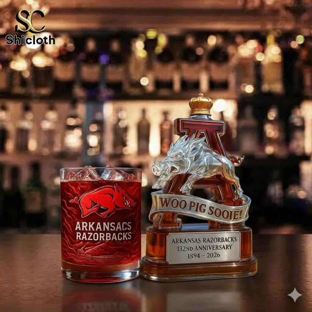 Arkansas Razorbacks whiskey bottle and glass set on bar counter!