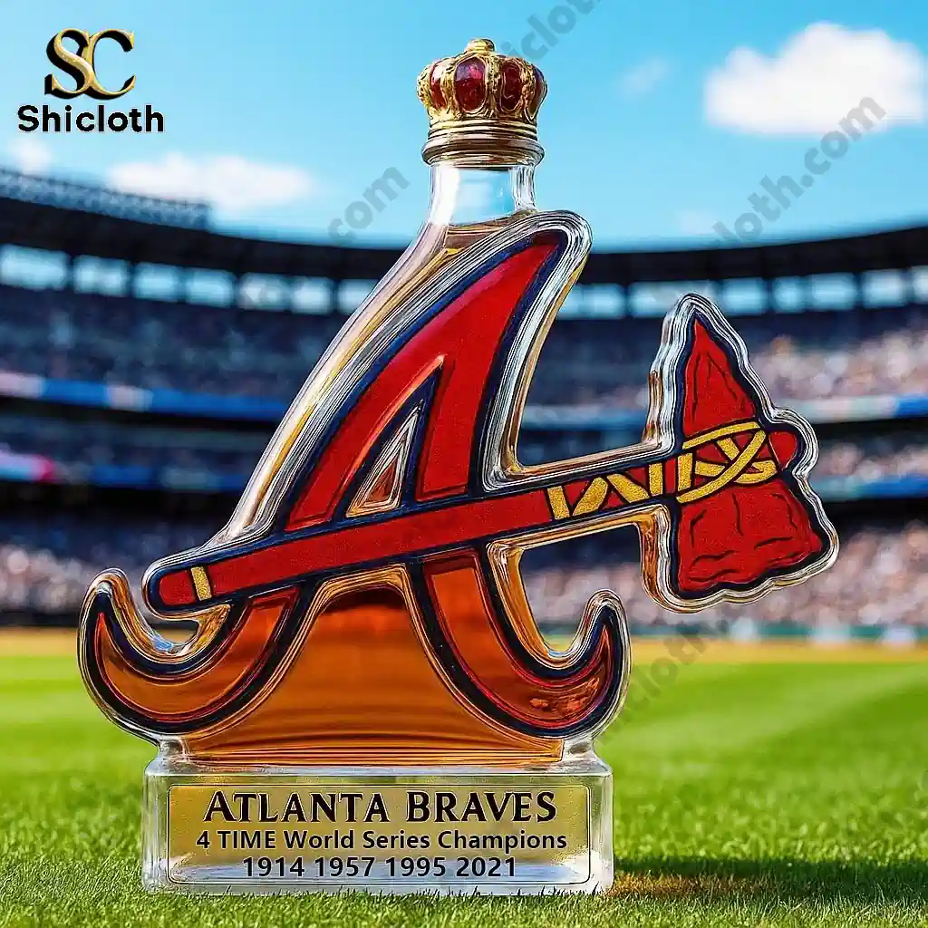 Atlanta Braves logo shaped whiskey bottle with crown cap displayed on a baseball field.