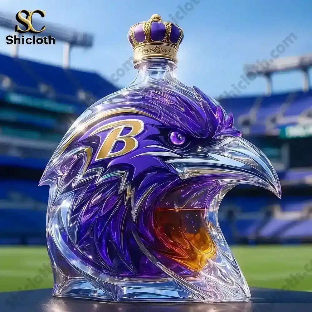 Raven head shaped whiskey bottle with purple gold design displayed in a football stadium!