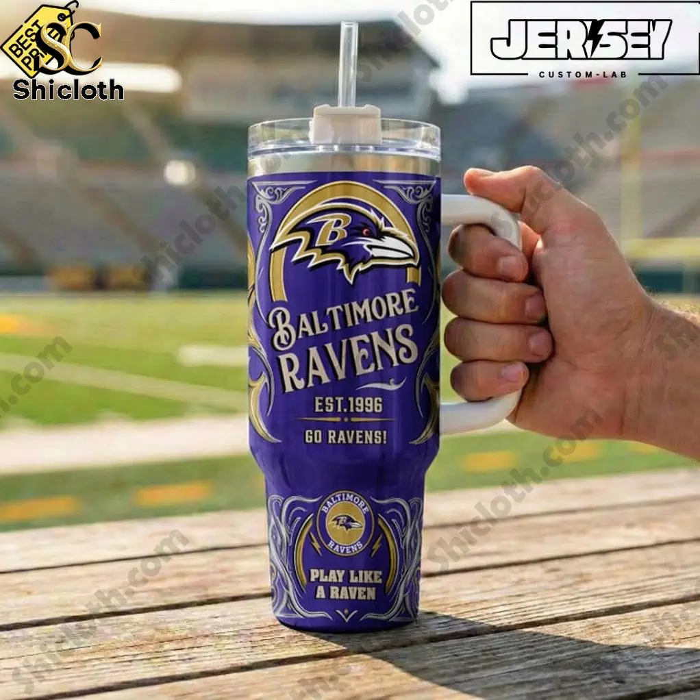 Close up of Baltimore Ravens purple tumbler held in stadium