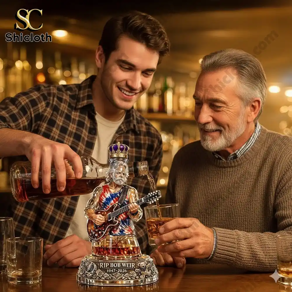 A decorative musician whiskey bottle sculpture on a bar counter while two men pour drinks.