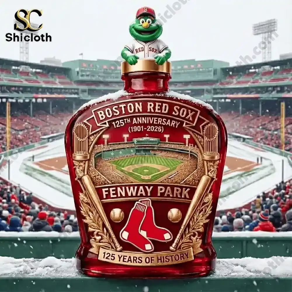 Boston Red Sox 125th anniversary whiskey bottle displayed in front of snowy Fenway Park.