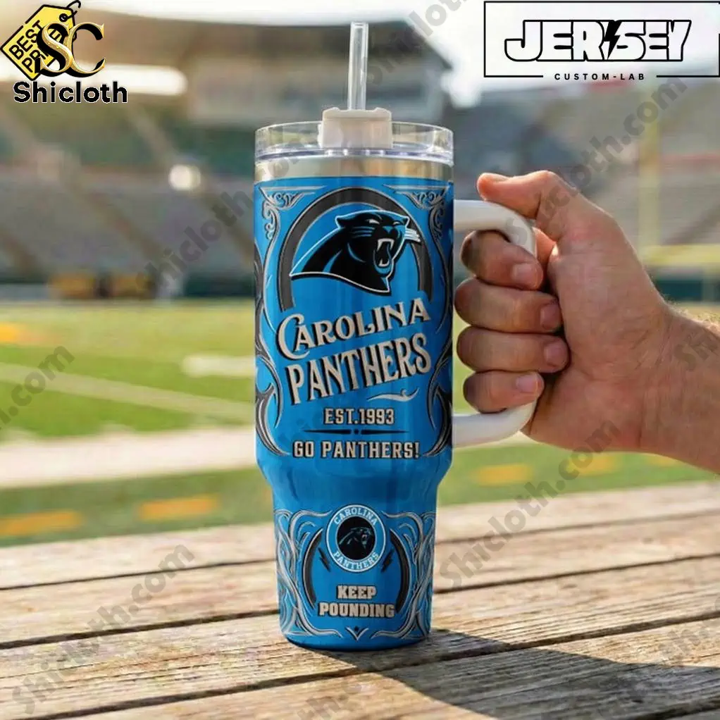 Close up of Carolina Panthers Keep Pounding Special YETI Tumbler held at football stadium