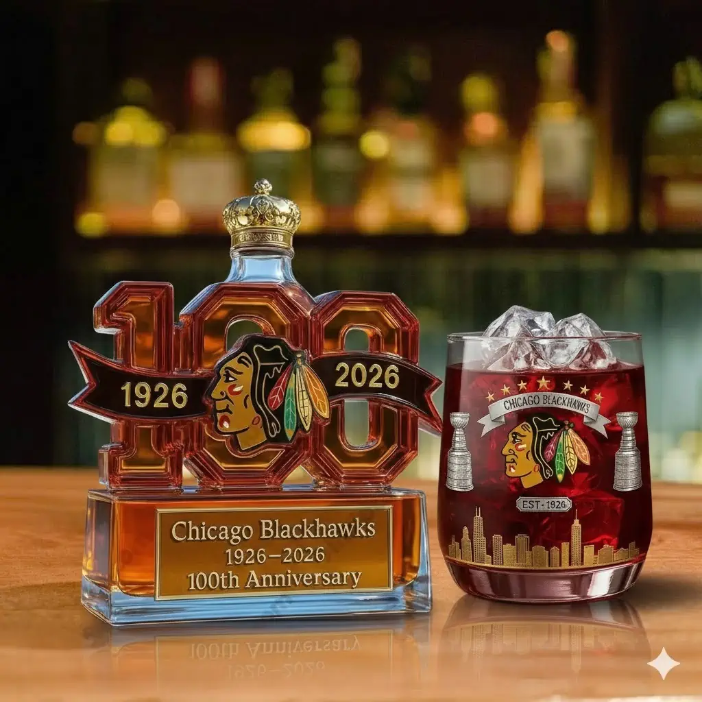 Chicago Blackhawks anniversary whiskey bottle with matching glass on bar counter!