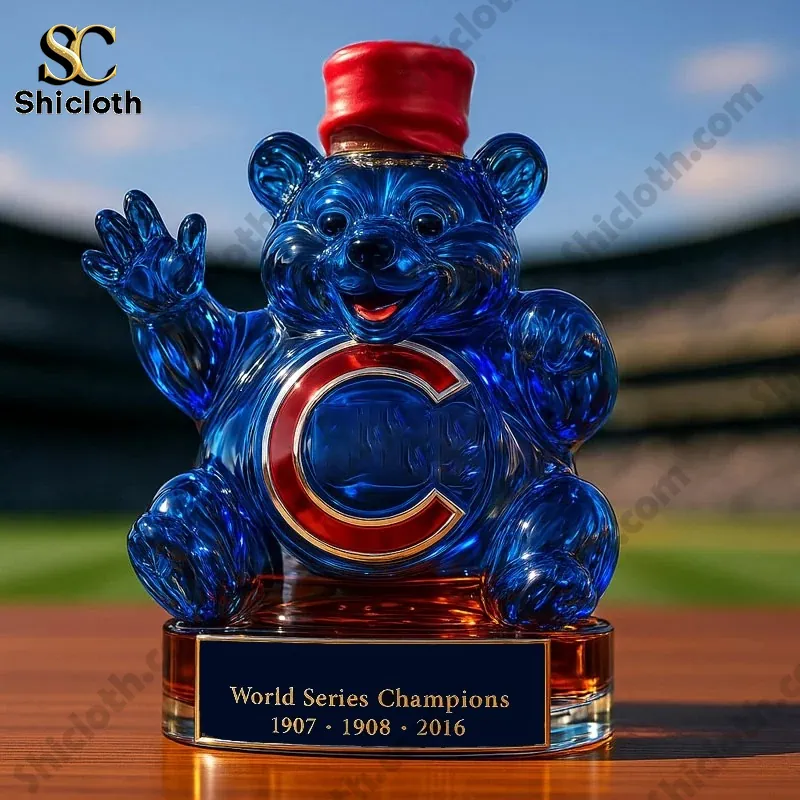 Blue bear shaped whiskey bottle with a red cap on a baseball field.