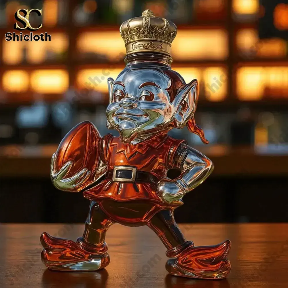 Close view of a glass football elf bottle holding a ball!