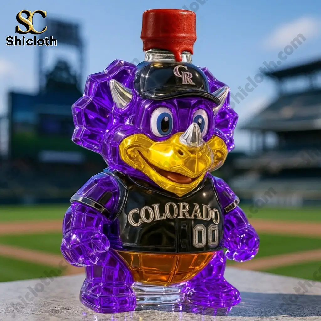 Colorado Rockies Whiskey Bottle 3 Purple Colorado Rockies dinosaur whiskey bottle with a red cap on a baseball field.