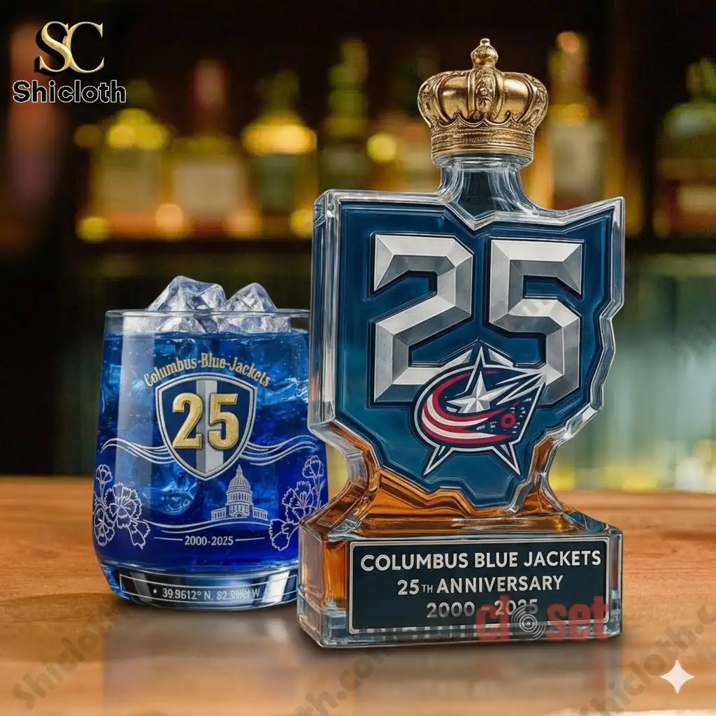 Columbus Blue Jackets anniversary whiskey bottle and glass set displayed on a bar!