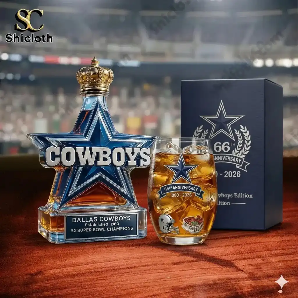 Dallas Cowboys star shaped whiskey bottle with crown cap beside a whiskey glass and 66th anniversary gift box!
