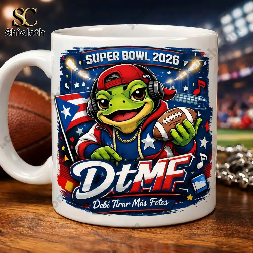Shicloth Super Bowl 2026 mug with a cartoon frog wearing headphones and holding a football!