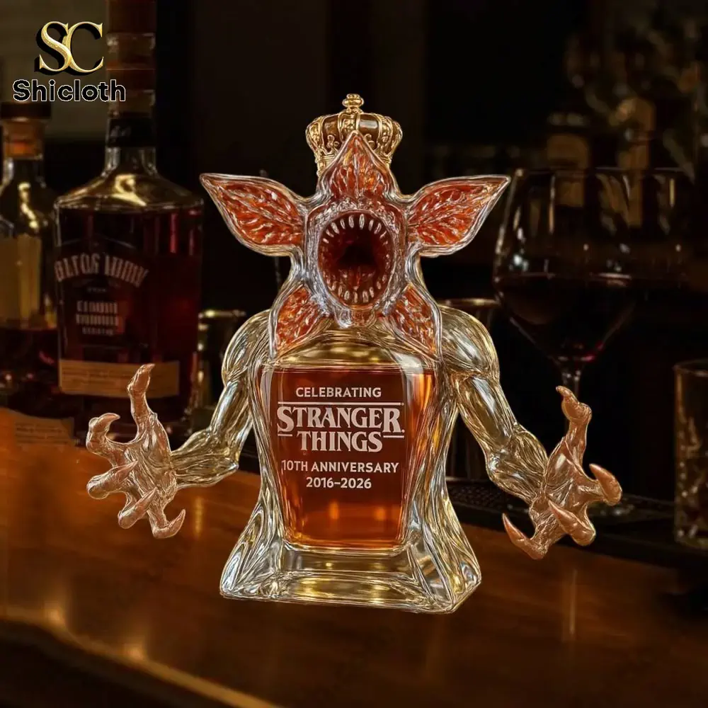 Stranger Things 10th anniversary Demogorgon shaped glass liquor bottle on a bar counter