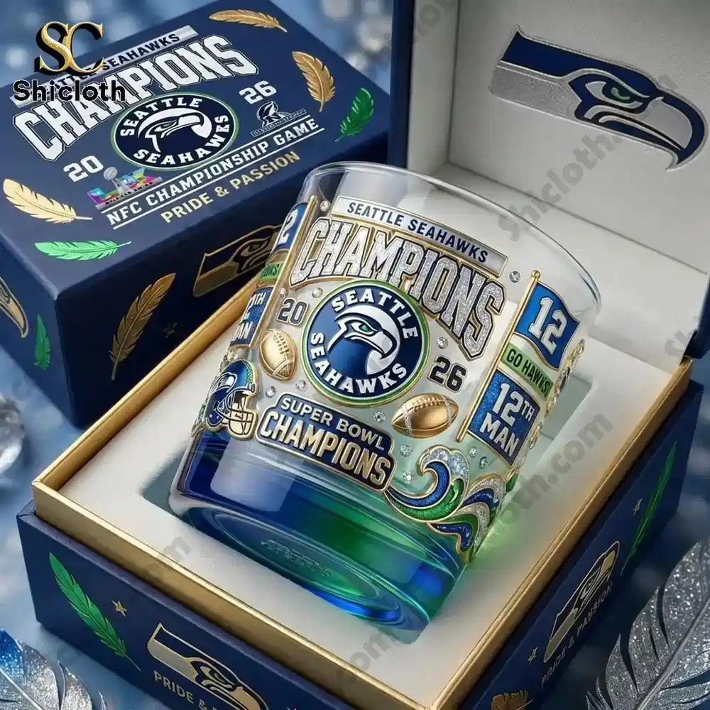 Seattle Seahawks Super Bowl LX Champions 2026 Whiskey Bottle And Glass Combo Set 3 Seattle Seahawks Super Bowl LX commemorative whiskey bottle with fan celebration in the background.