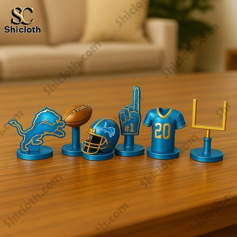 Detroit Lions themed Monopoly game tokens lined up on a wooden table!
