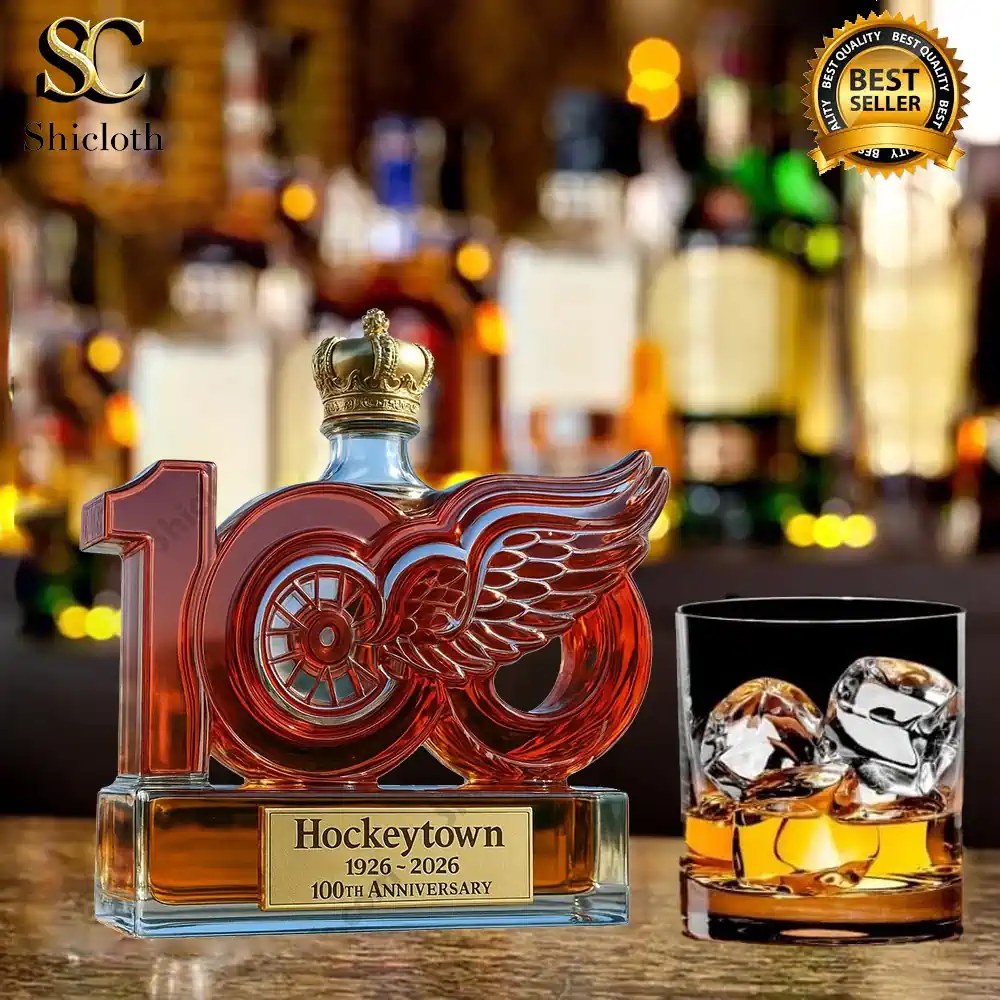 Detroit Red Wings Hockey Town 100th Anniversary Whiskey Bottle And Glass Combo Set 3 Hockeytown centennial glass decanter with winged wheel and whiskey glass on bar!