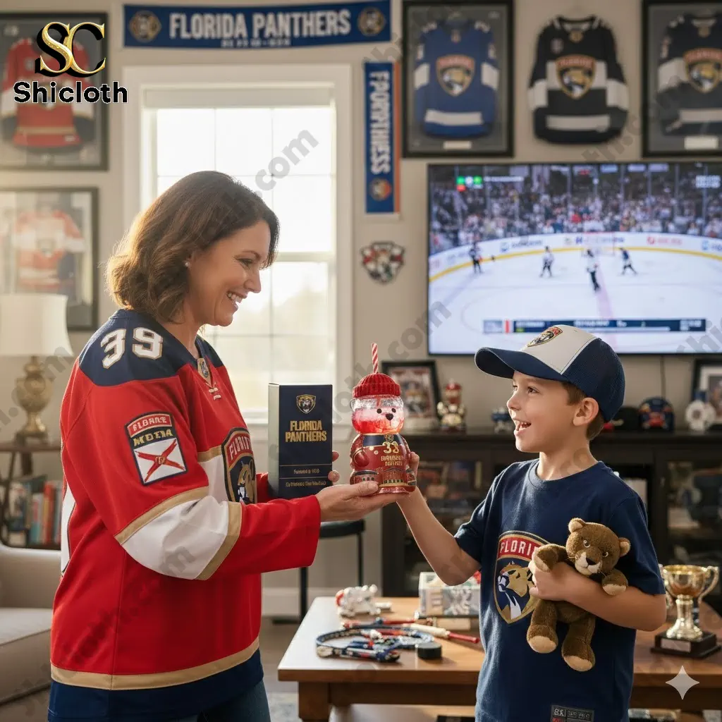 A woman giving a boy a Florida Panthers bear shaped bottle in a hockey themed living room.