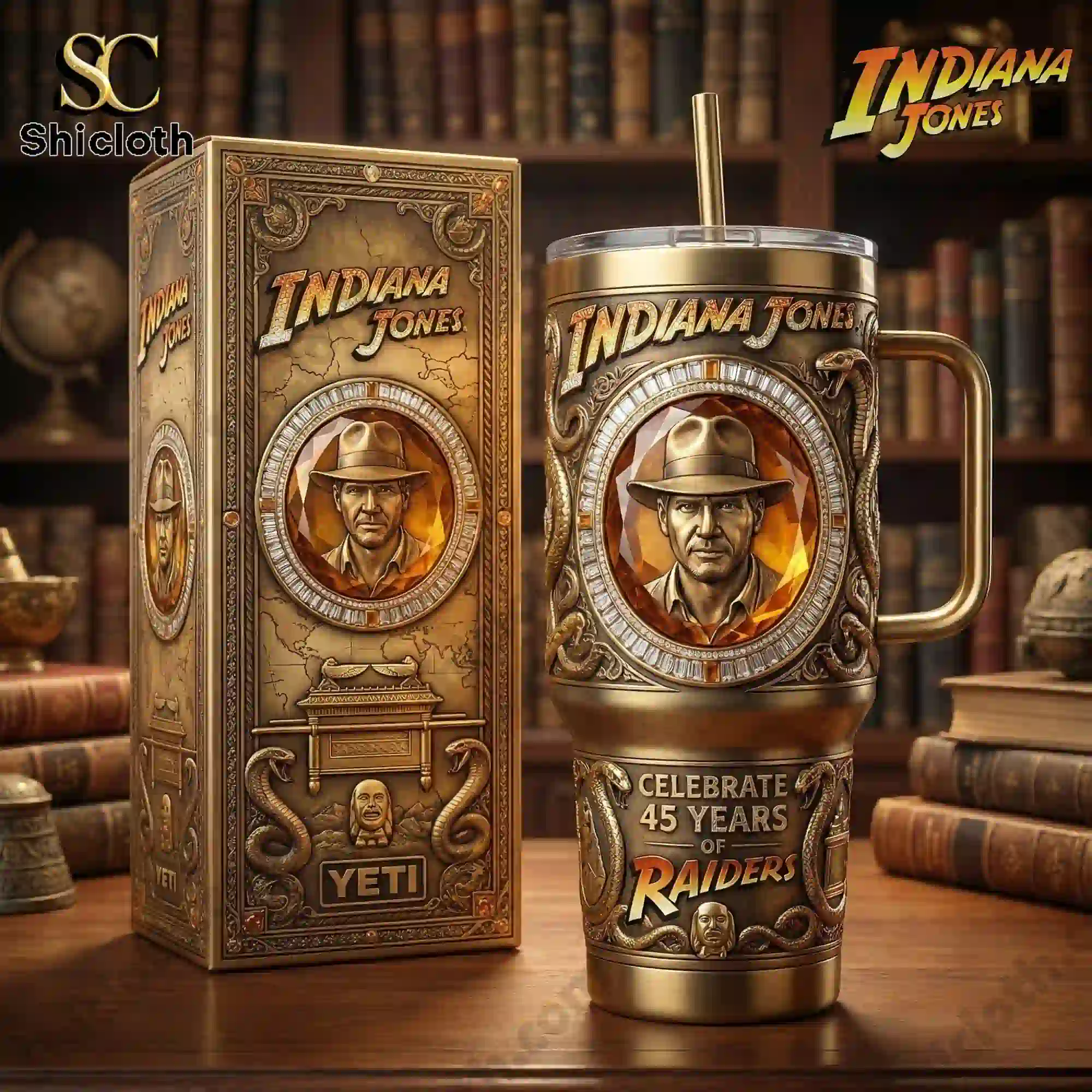 Indiana Jones themed insulated tumbler with handle shown beside its decorative gift box on a wooden table.