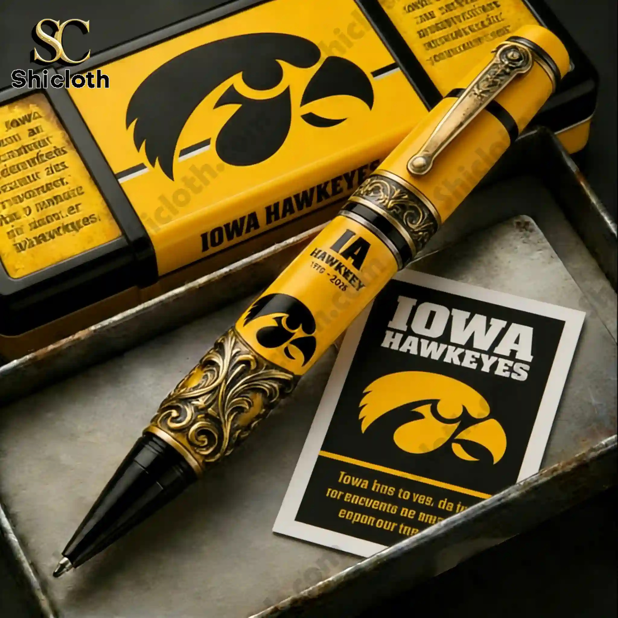 Close up of Iowa Hawkeyes commemorative pen with decorative box