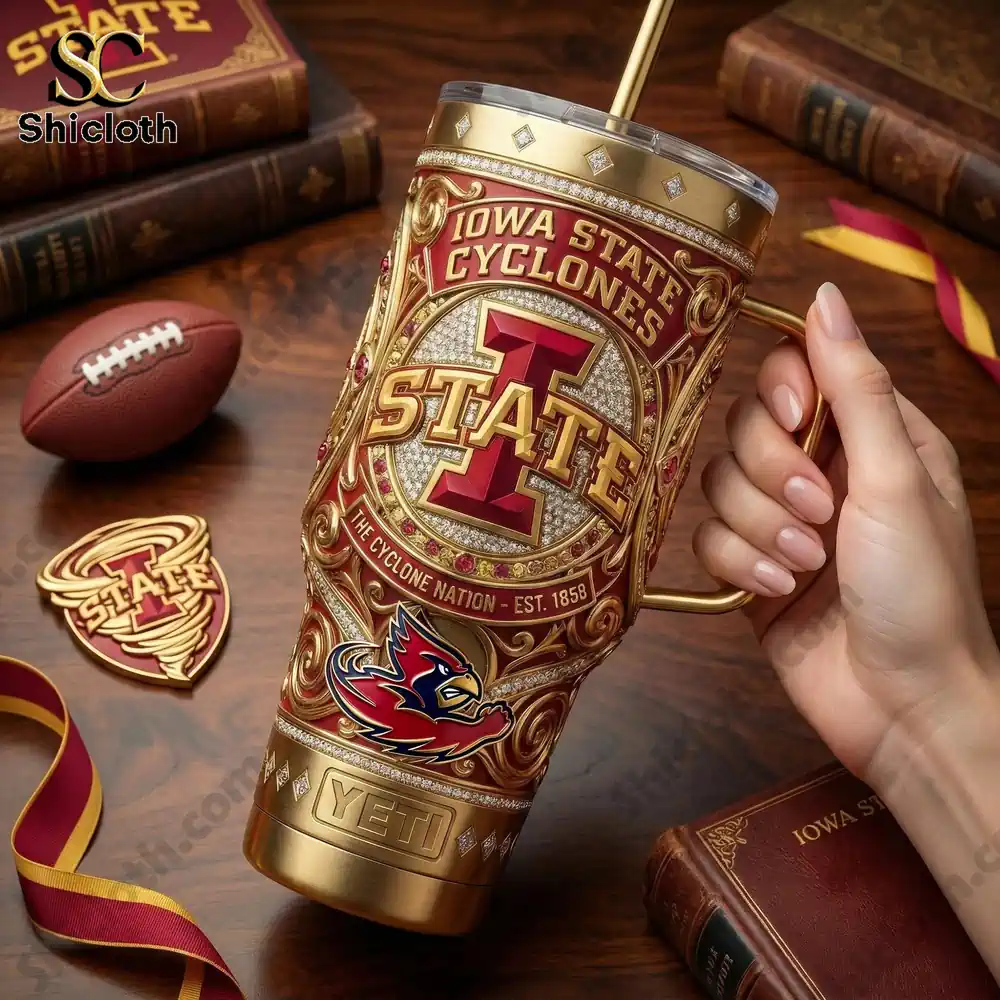Iowa State Cyclones 40oz Tumbler With Handle 3 Hand holding an Iowa State Cyclones Yeti tumbler with ornate gold design!
