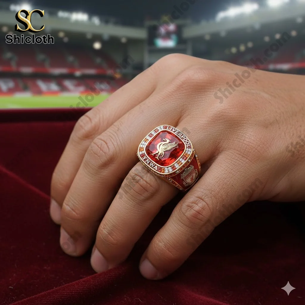 Liverpool themed championship ring worn on hand inside stadium