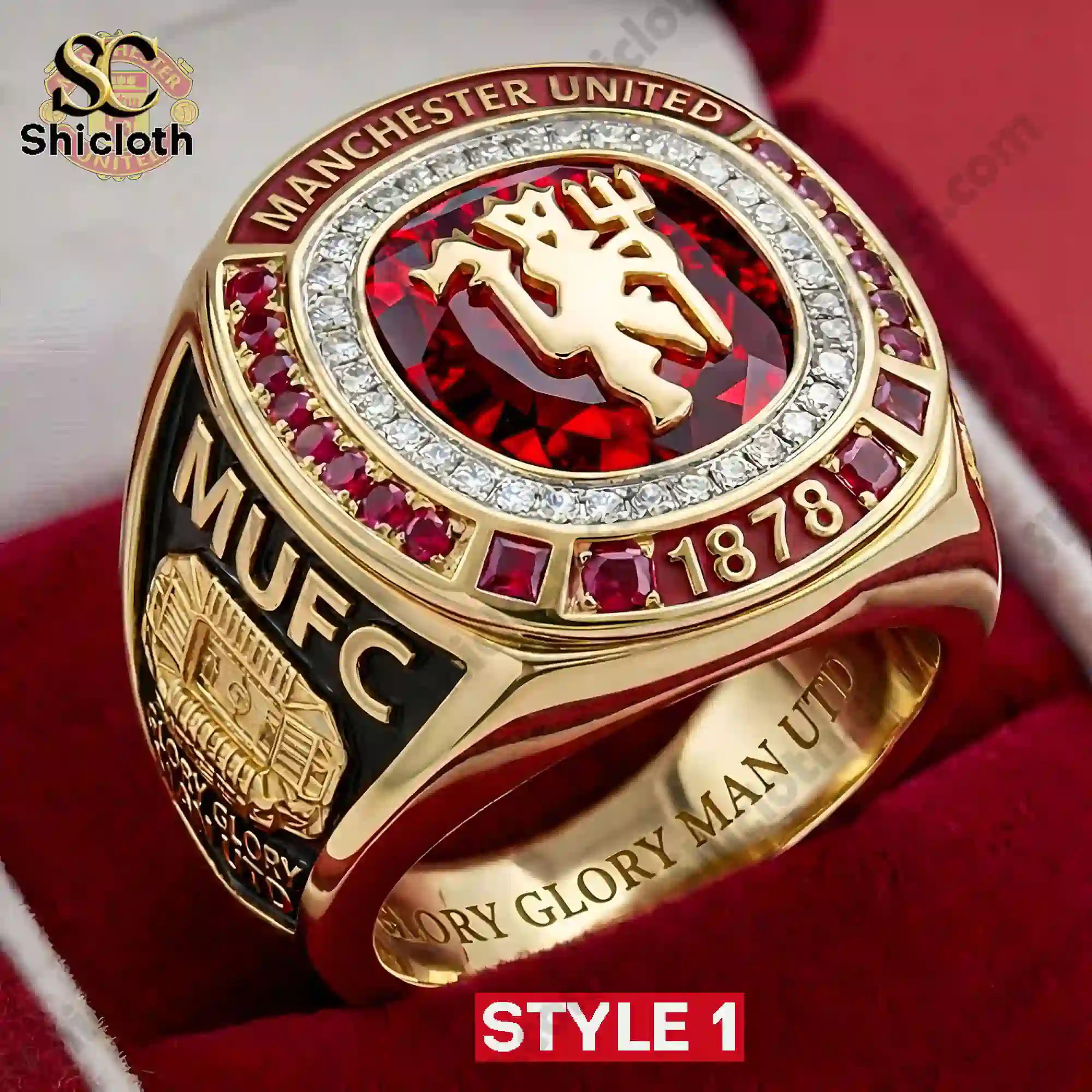 Close up gold Manchester United ring with red gemstone and year 1878