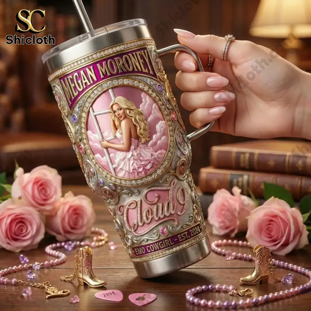 Megan Moroney Emo Cowgirl 40 OZ Tumbler 3 Hand holding an ornate pink tumbler surrounded by roses and jewelry!