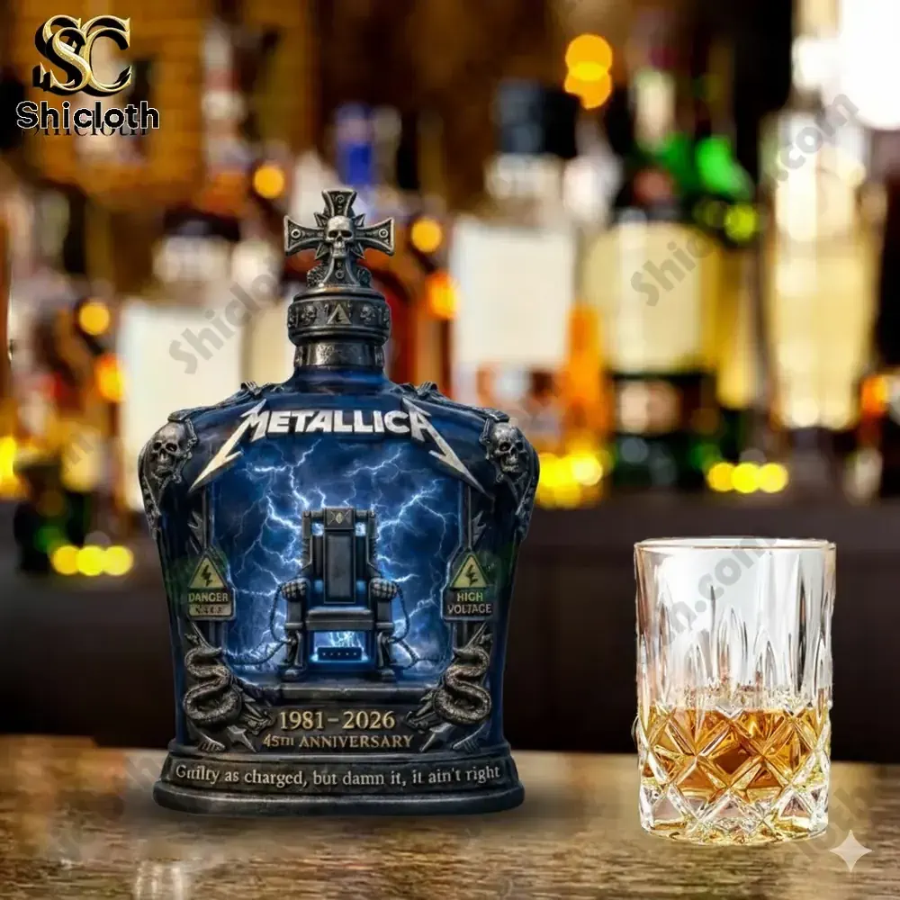 Metallica whiskey decanter beside classic whiskey glass on bar!