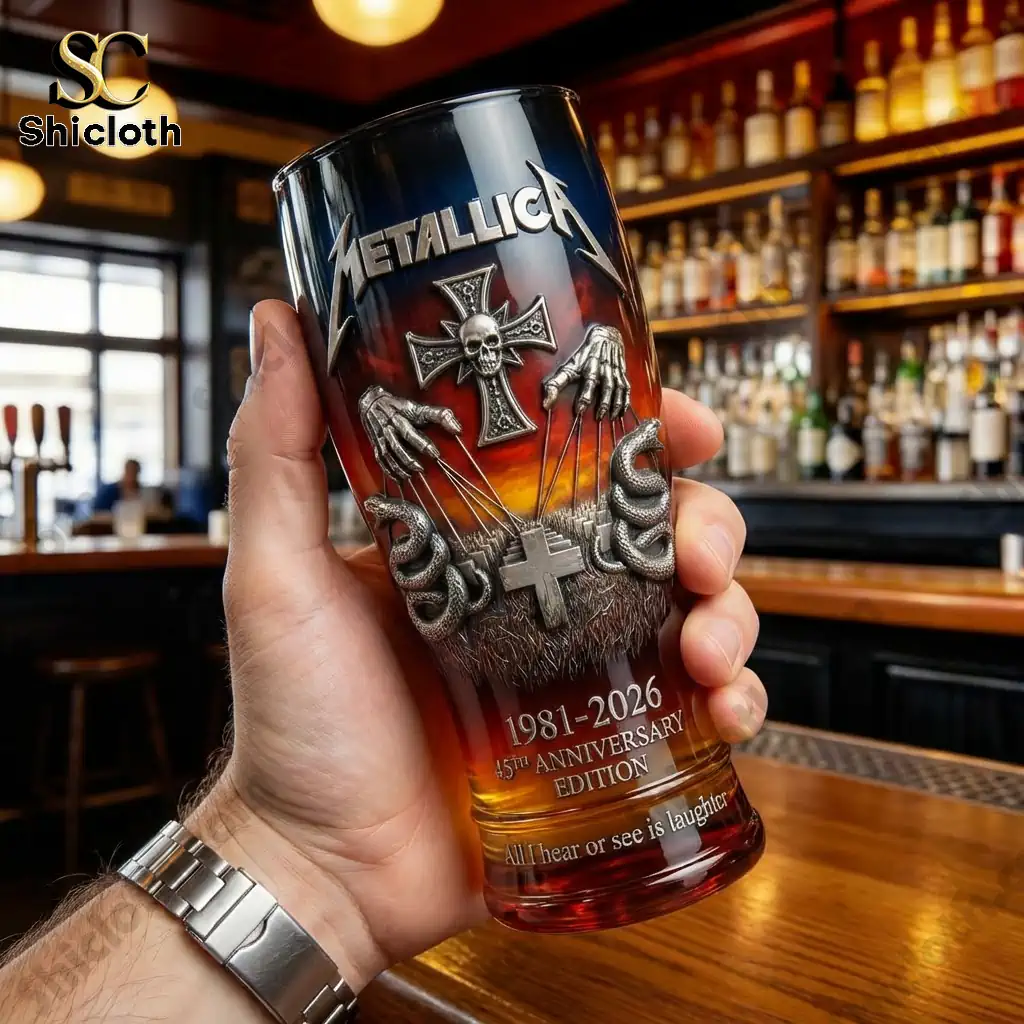 Metallica 45th Anniversary Edition Beer Glass 4 Hand holding Metallica anniversary beer glass in bar setting!
