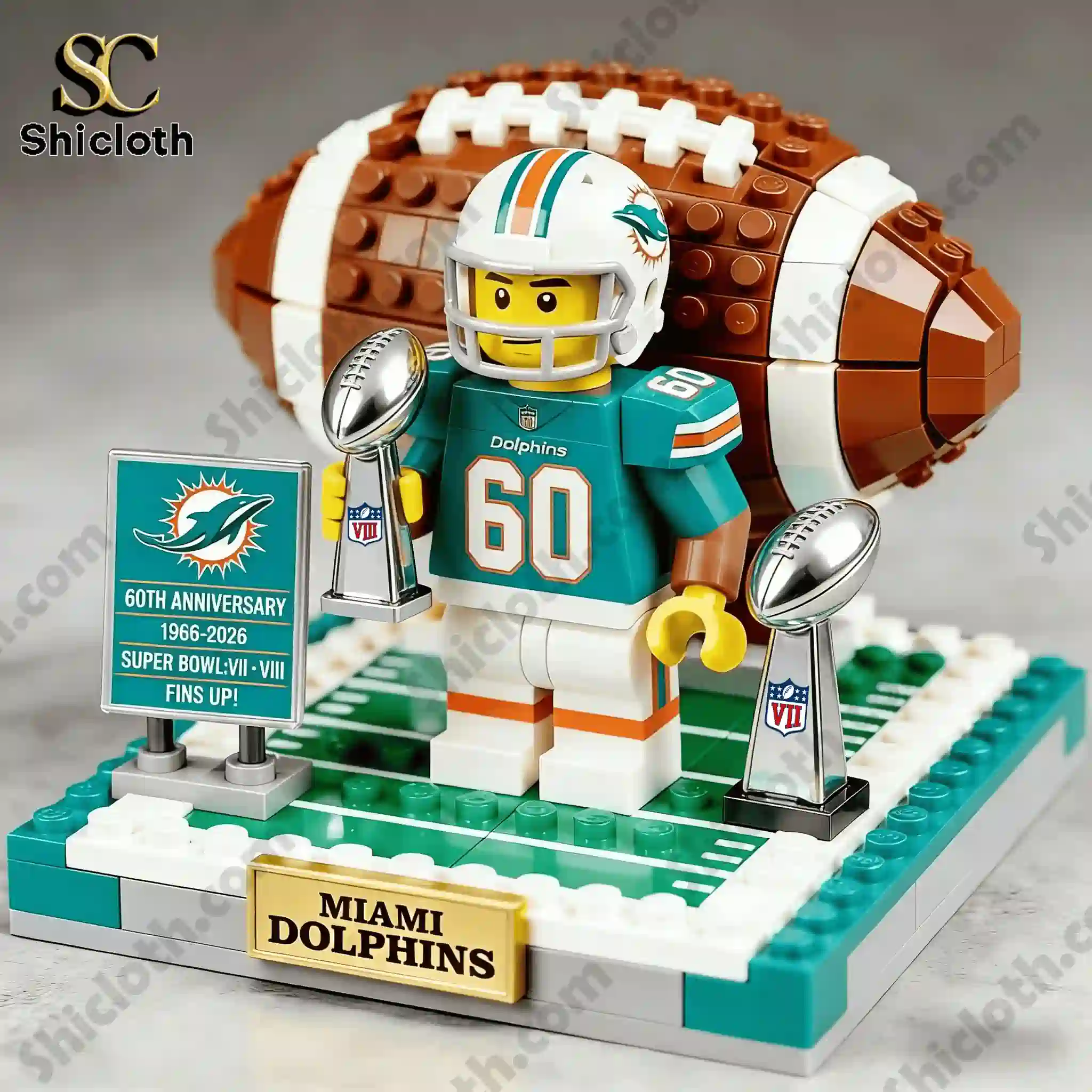 Close up of Miami Dolphins anniversary brick figure with football and trophies on display base!