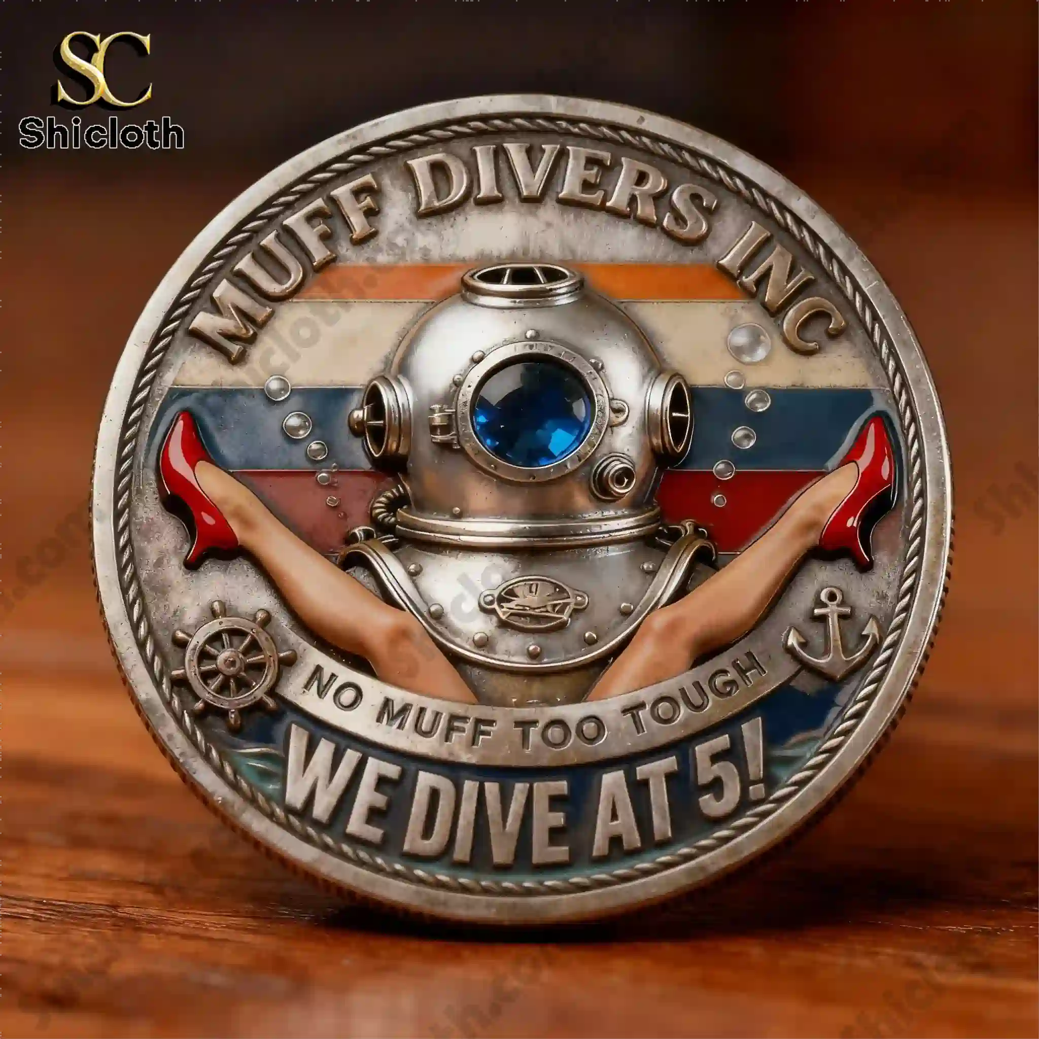 Close up of a diver helmet coin with bold lettering and red heels design!