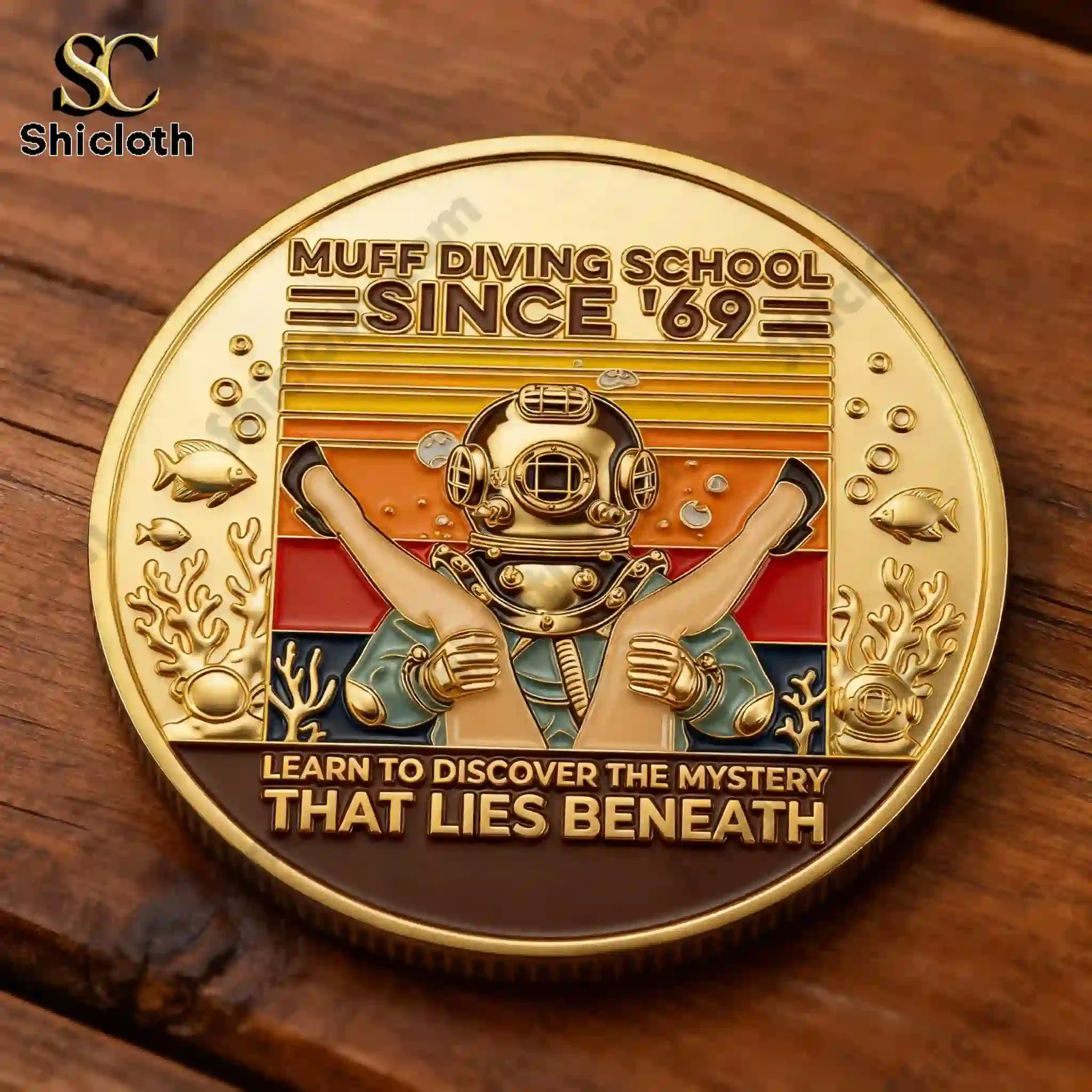 Close up front view of Shicloth Muff Diving School Since 69 diving coin with vintage helmet design!