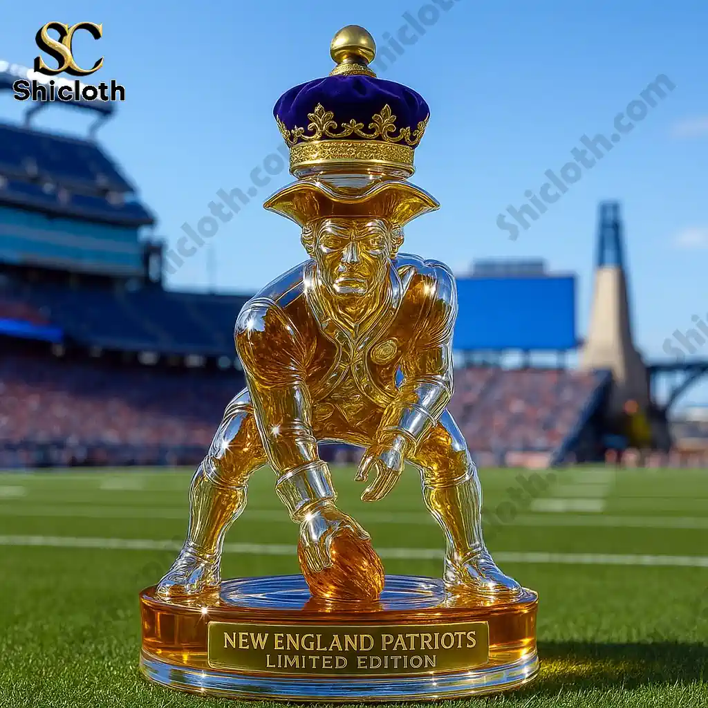 Golden New England Patriots limited edition whiskey bottle with purple crown on football field