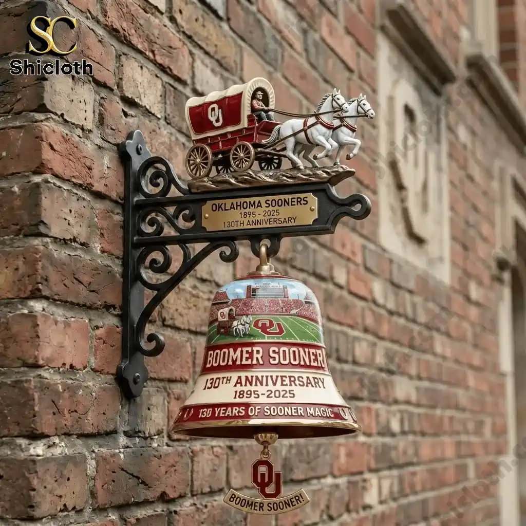 Oklahoma Sooners 130th Anniversary commemorative wall bell mounted on brick wall