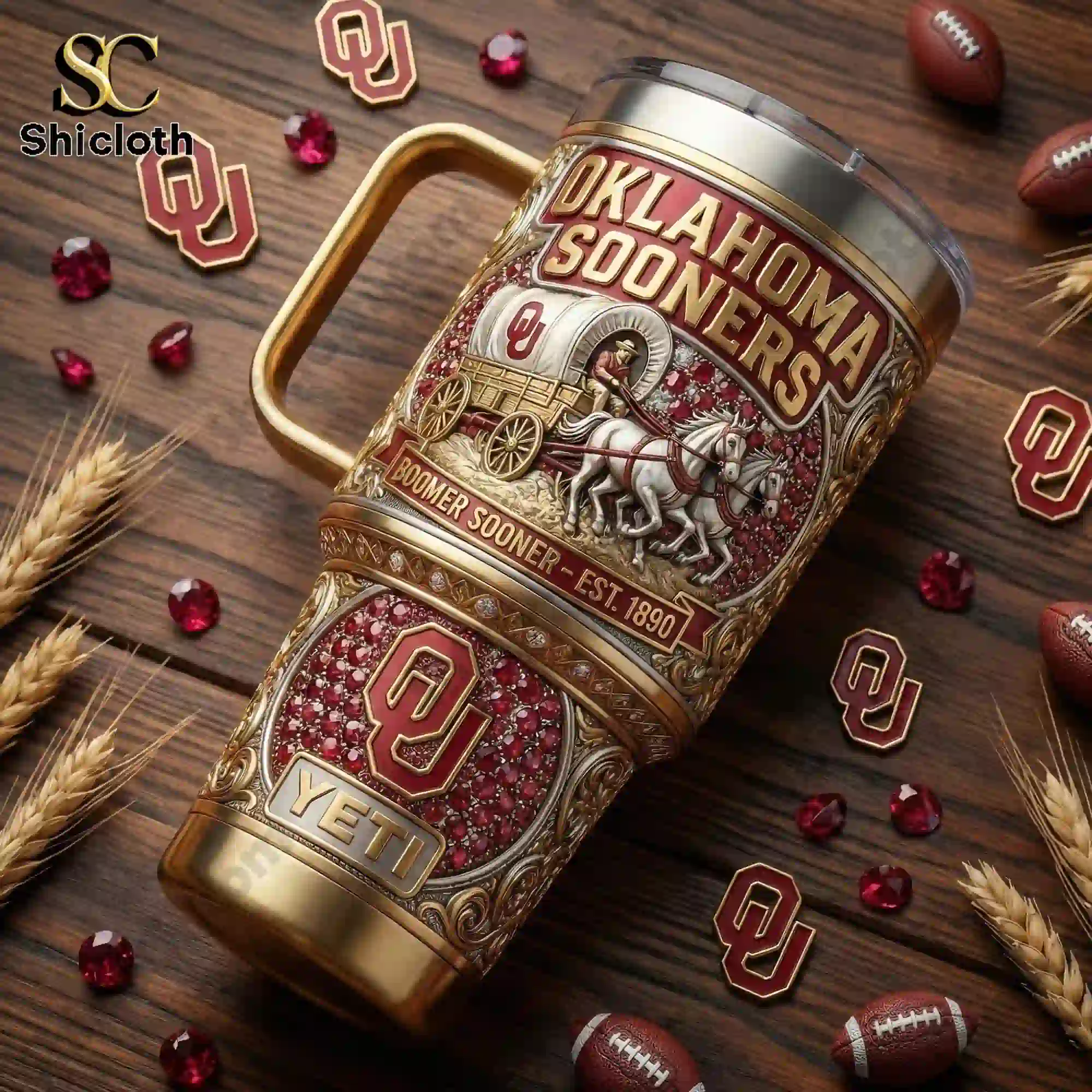 Oklahoma Sooners Boomer Sooner Limited Edition 40oz Tumbler with Handle 4 Oklahoma Sooners tumbler mug on wooden table with OU themed decorations.