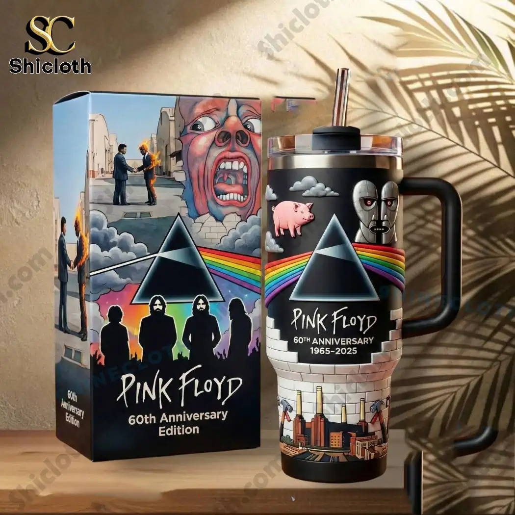 Pink Floyd 60th Anniversary tumbler with handle and matching gift box on a table!
