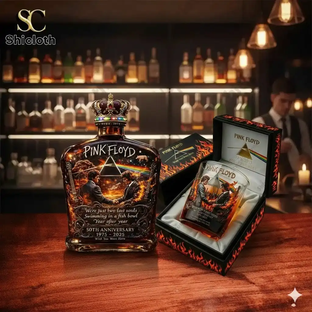 Pink Floyd themed whiskey decanter with crown stopper on a bar table!