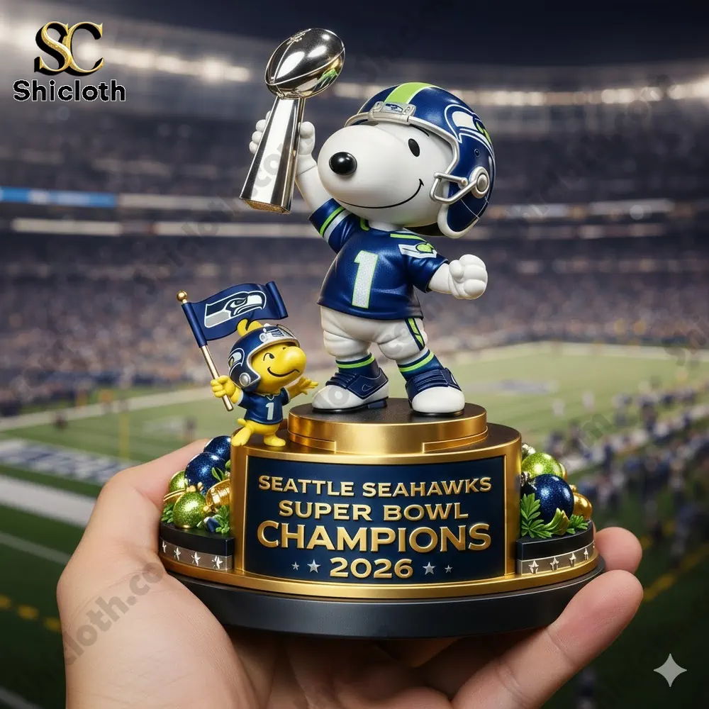 Snoopy football figure holding a championship trophy in a stadium setting!