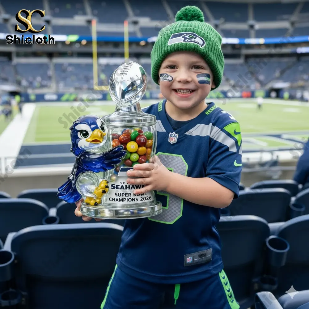 Child holding Seahawks candy jar toy in stadium!