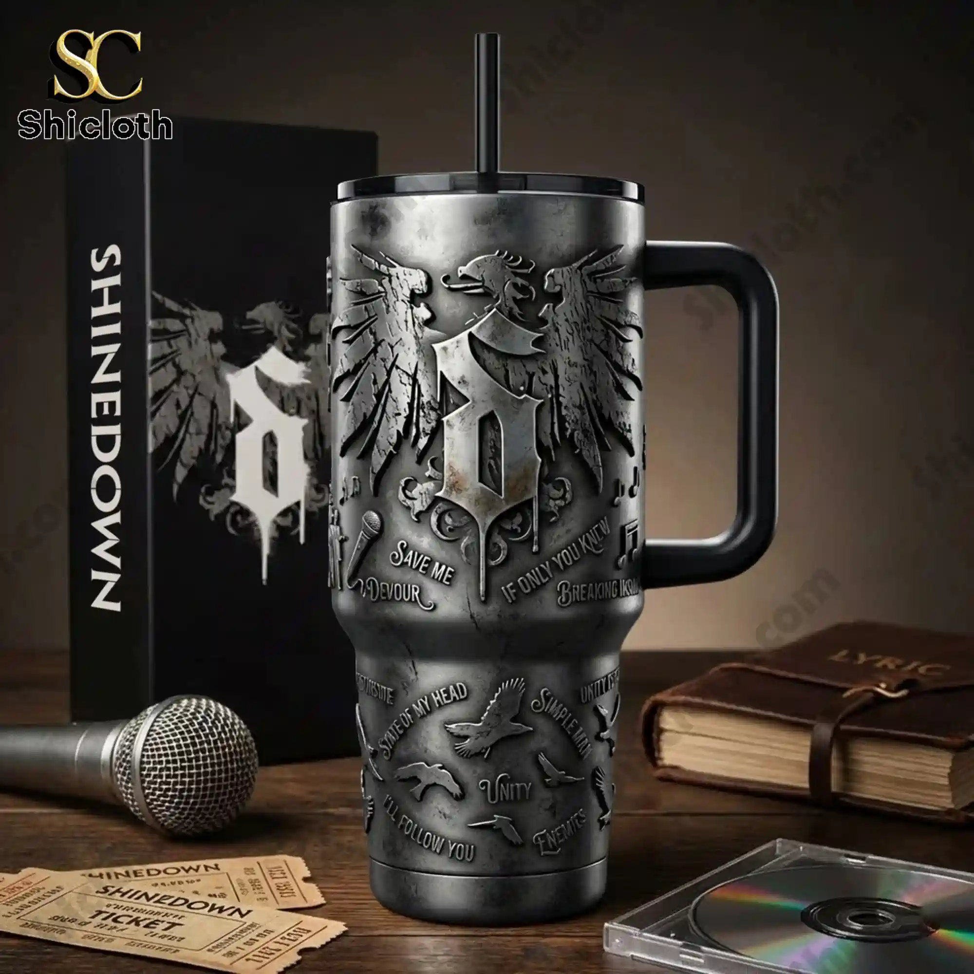 Shinedown themed metal tumbler with handle displayed beside product box on a table!
