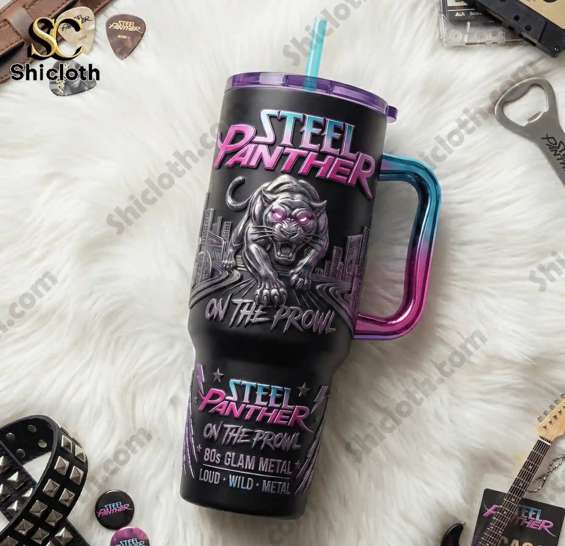 Steel Panther On the Prowl 40oz Tumbler With Handle 4 Steel Panther tumbler with handle lying on white fur background with rock accessories.