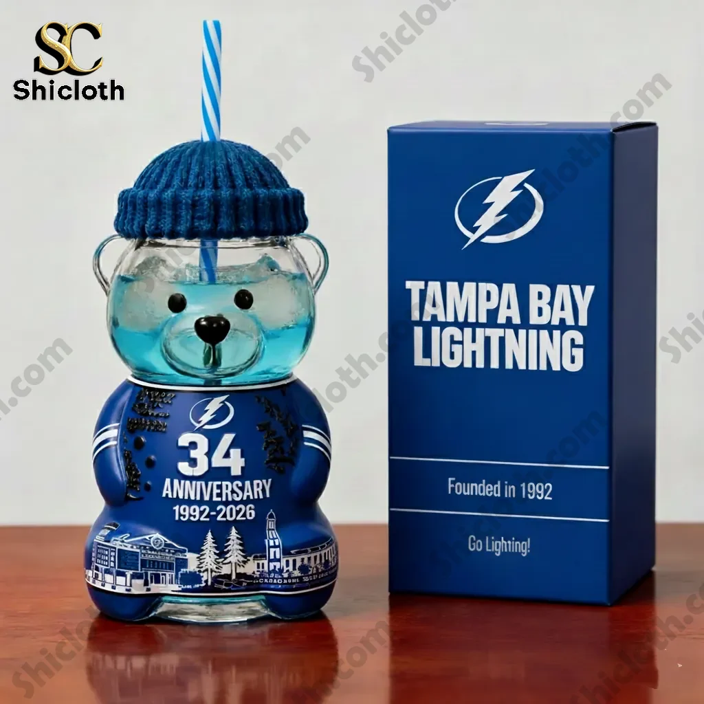 Close view of Tampa Bay Lightning thirty four anniversary bear bottle beside branded blue box!