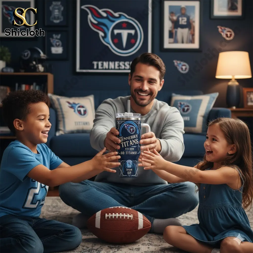 Family holding Tennessee Titans Titan Up Special YETI Tumbler in team themed living room