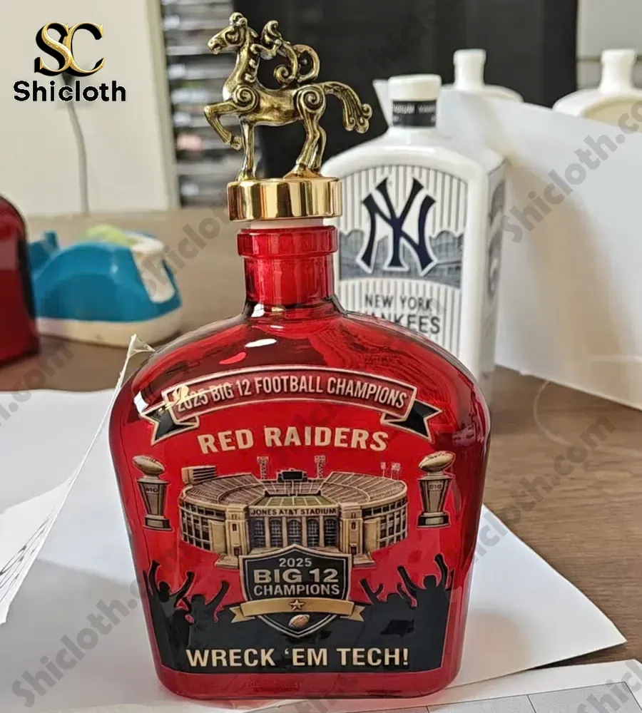 Shicloth Red Raiders 2025 Big 12 Champions red bottle with gold horse topper on desk!