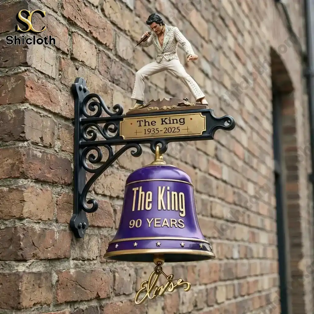 Purple The King 90 Years wall bell mounted on brick wall with Elvis figure on top!