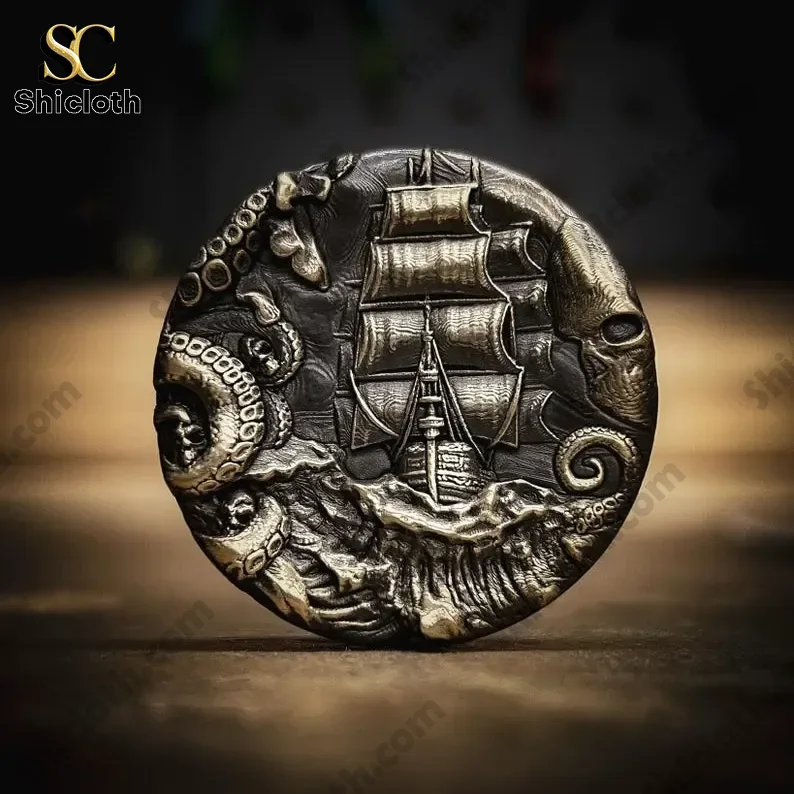 The Pirate Galleon and Sea Monster Coin 3 Close up of Shicloth coin with pirate galleon and sea monster design