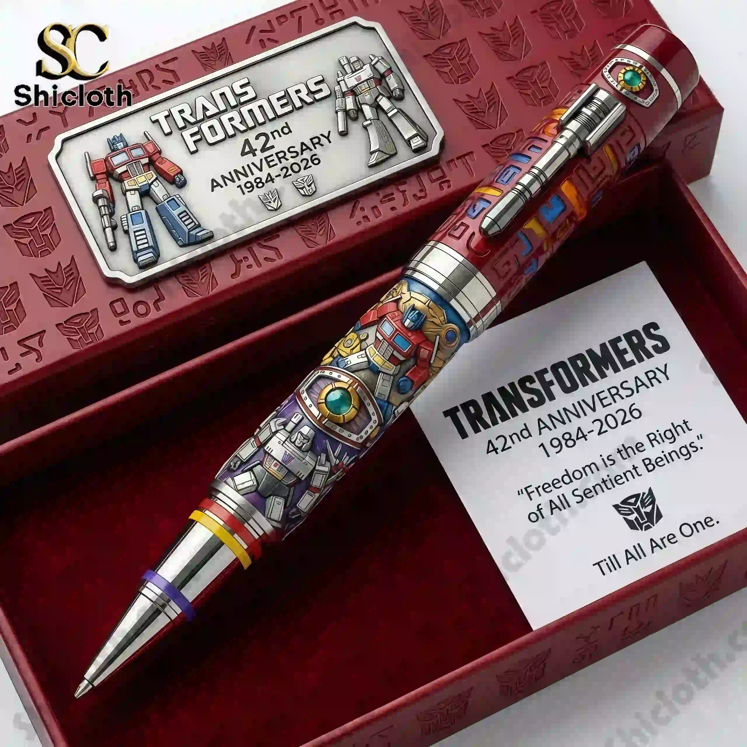 Close up of Transformers 42nd Anniversary collector pen in red presentation box